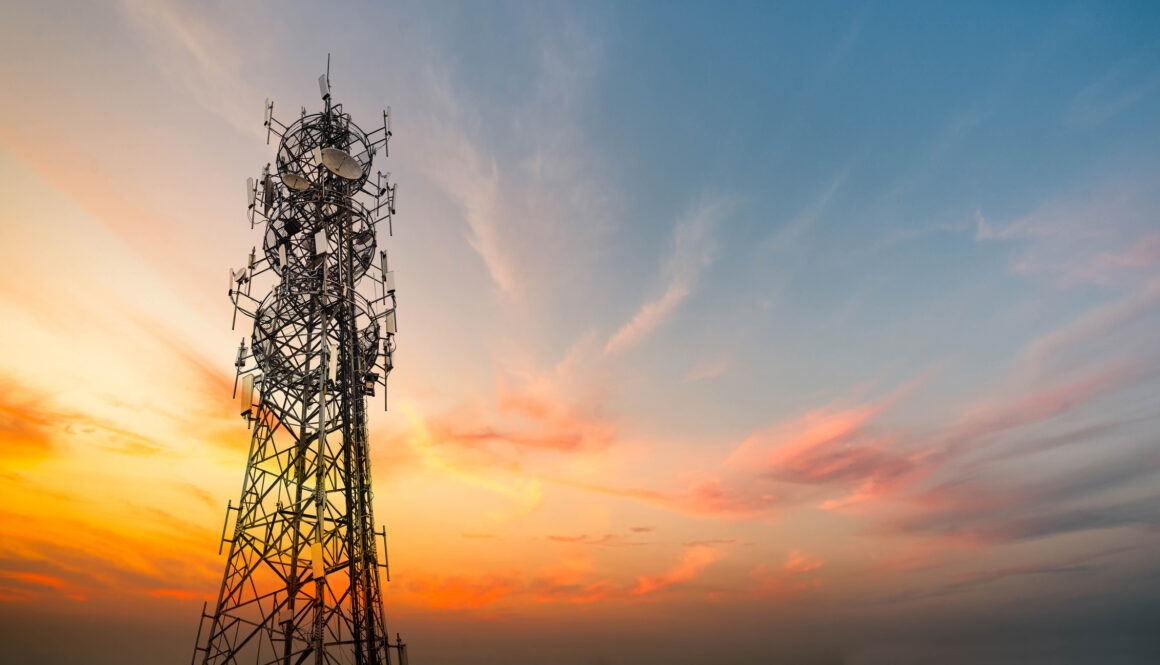5G Sunset Cell Tower: Cellular communications tower for mobile phone and video data transmission